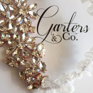Gorgeous Rhinestones set into a Rose Gold setting on organza wedding garter