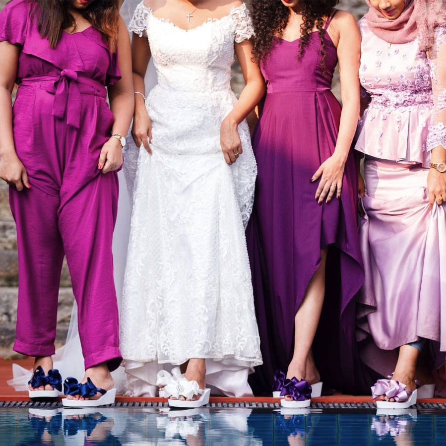 Bride and her Bridesmaids wearing their Flip Flops